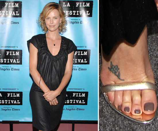 Charlize-Theron-sports-small-flower-top-her-right-foot